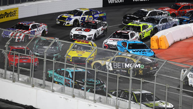 Kyle Busch, driver of the #8 BetMGM Chevrolet, spins after an on-track incident as Joey Logano, driver of the #22 Shell Pennzoil Ford, and Ross Chastain, driver of the #1 Worldwide Express Chevrolet, pass during the Busch Light Clash at Los Angeles Memorial Coliseum on Sunday. (Photo by James Gilbert/Getty Images)